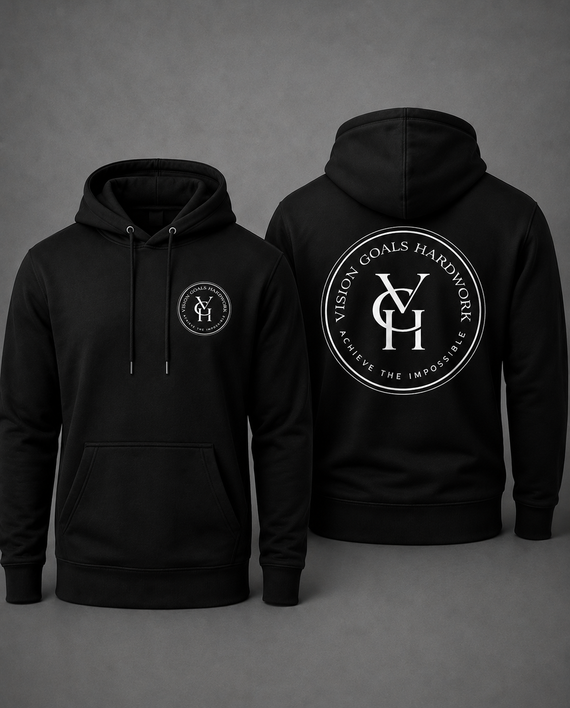 A Black hoodie shown from both the front and back on a dark gray studio background. The front features a small circular gold logo on the left chest, and the back features a large circular gold logo with the initials 'VGH' and the words 'VISION GOALS HARDWORK' and 'ACHIEVE THE IMPOSSIBLE.
