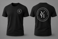 Black short-sleeve crewneck T-shirt shown from the front and back on a gray studio background. The front has a small white circular logo on the left chest, and the back has a large white circular logo with the letters "VGH", the words 'VISION GOALS HARDWORK' and 'ACHIEVE THE IMPOSSIBLE'.